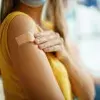 Woman receiving vaccine